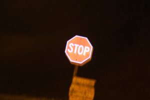 A stop sign signaling to stop feeling unsatisfied with life