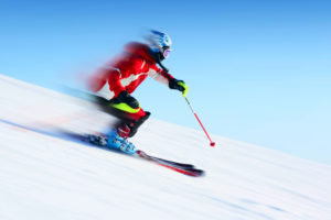 A person skiing down a mountain 
