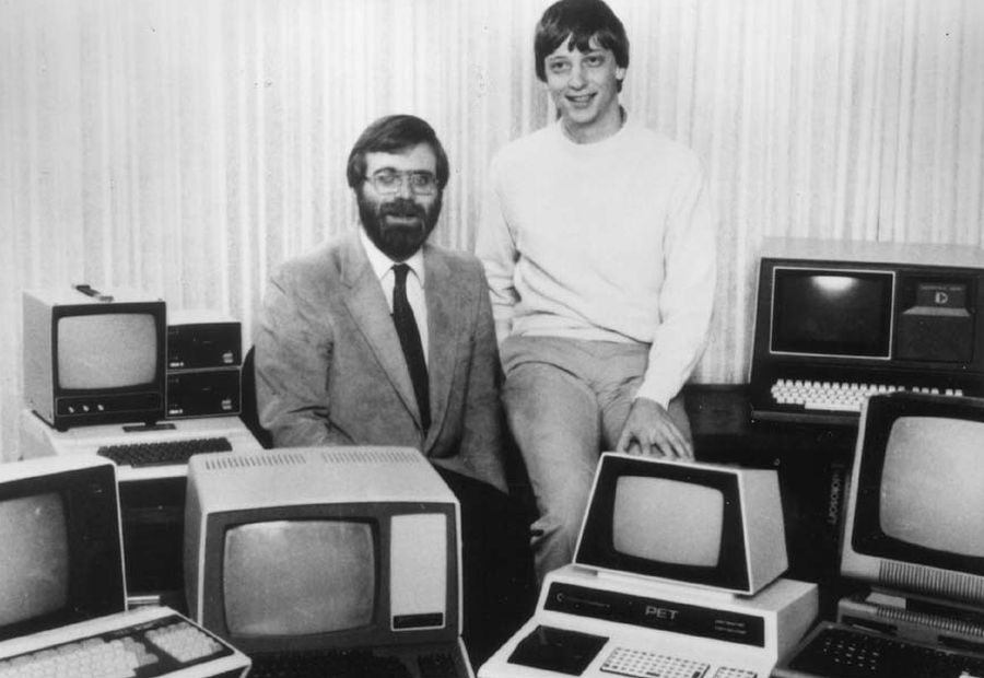 Bill Gates and Paul Allen posing with products of their productivity 