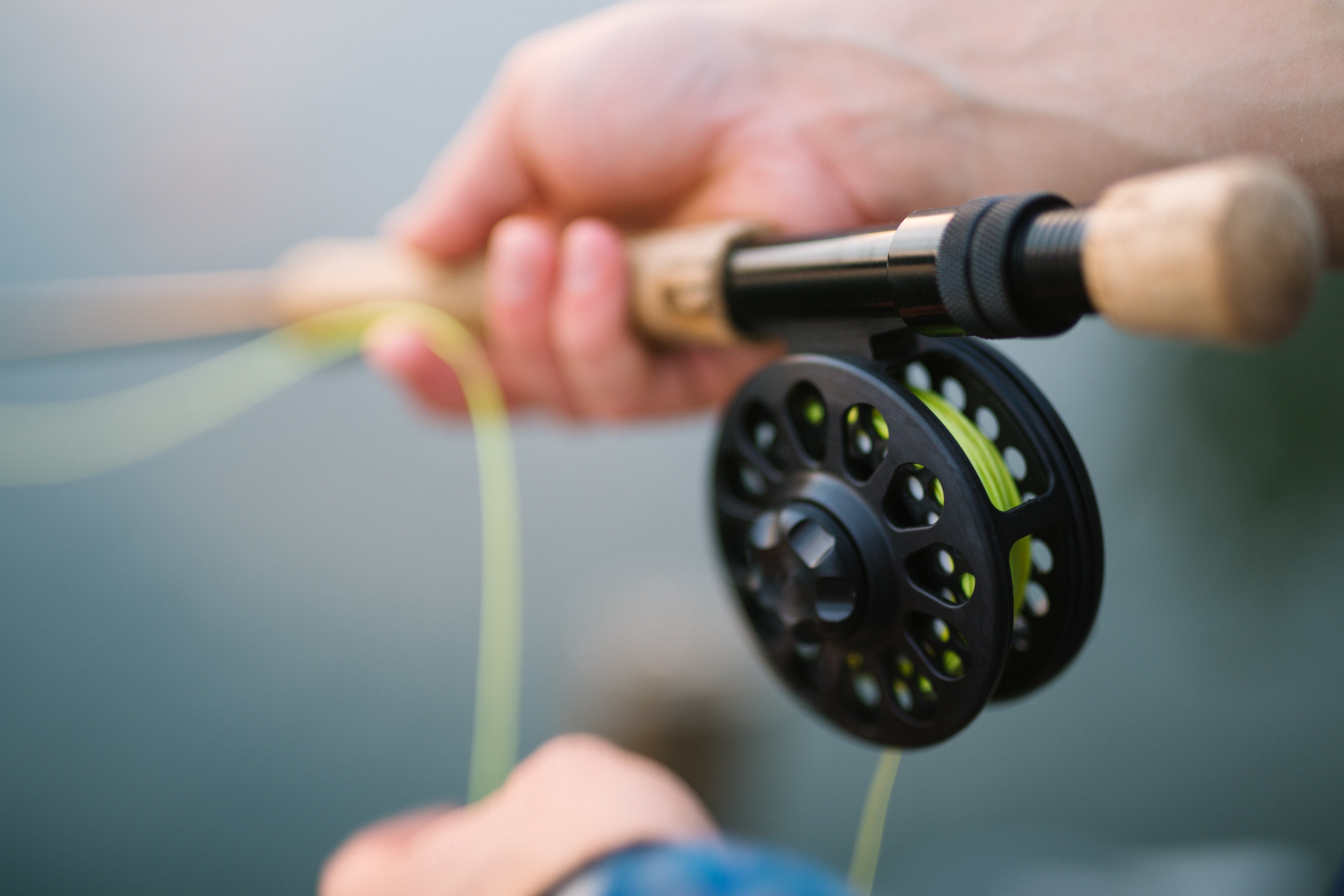 A close-up of a fishing reel, a quality downtime activity 