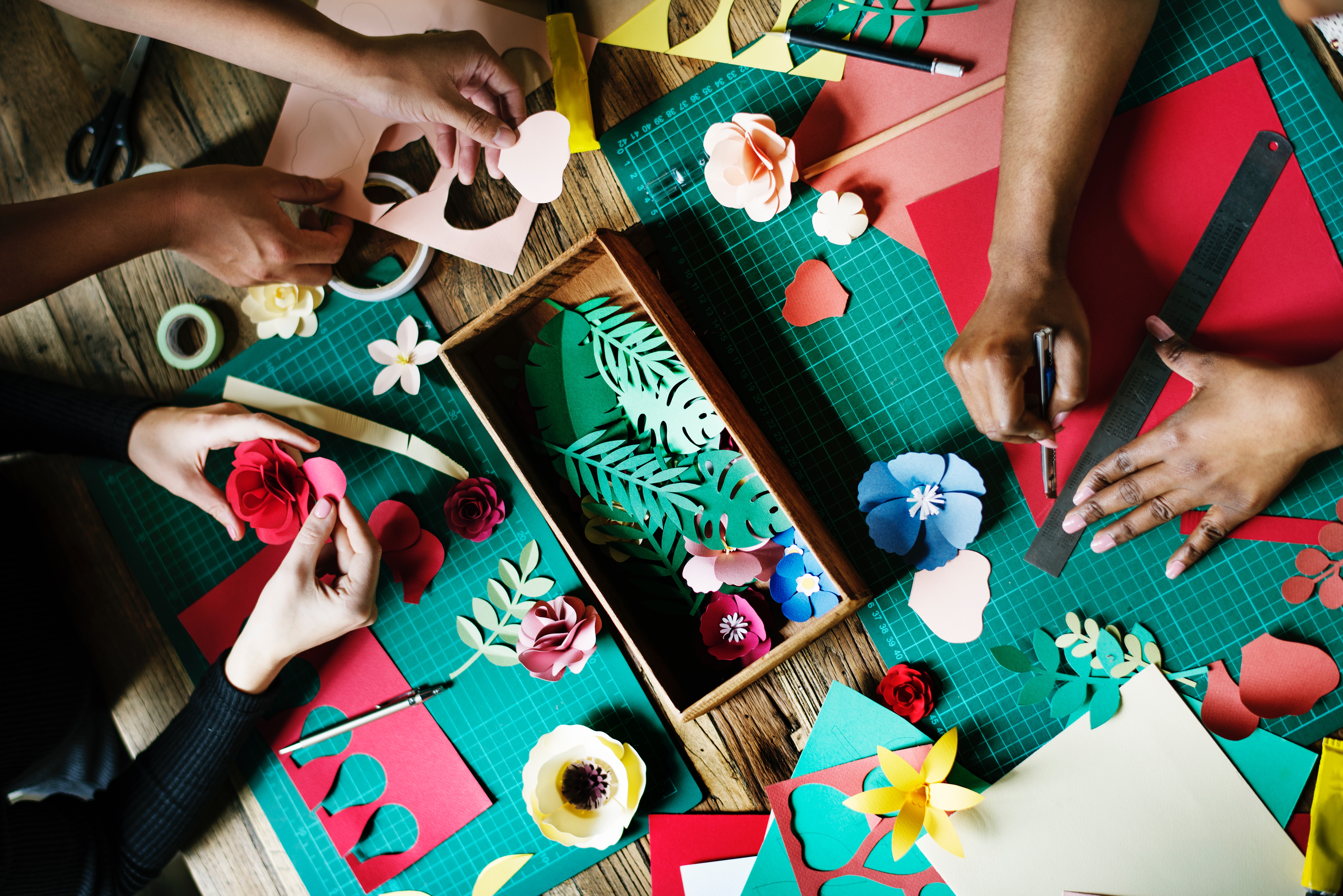 An overhead view of productive downtime by making crafts 