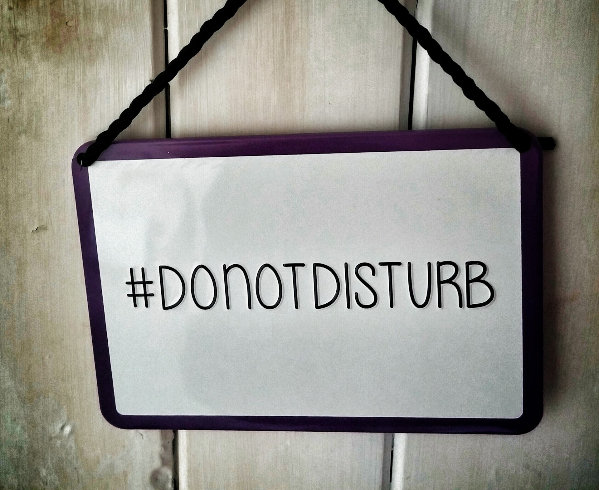 A do not disturb sign setting boundaries for being productive 
